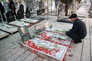 Photos: Iran's Parliament speaker visits graves of martyrs of Zionist regime's invasion
