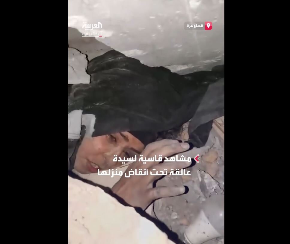 Painful scenes of a woman trapped beneath rubble of her home in Gaza