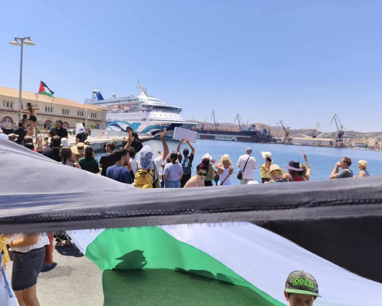 Israeli cruise ship turned away from Greek island by Gaza war protest