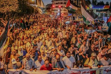 Wêneya Nûçeyan | Xwepêşandaneke girseyî li Tangier, Fas ji bo piştgiriya bi Xezzeyê re