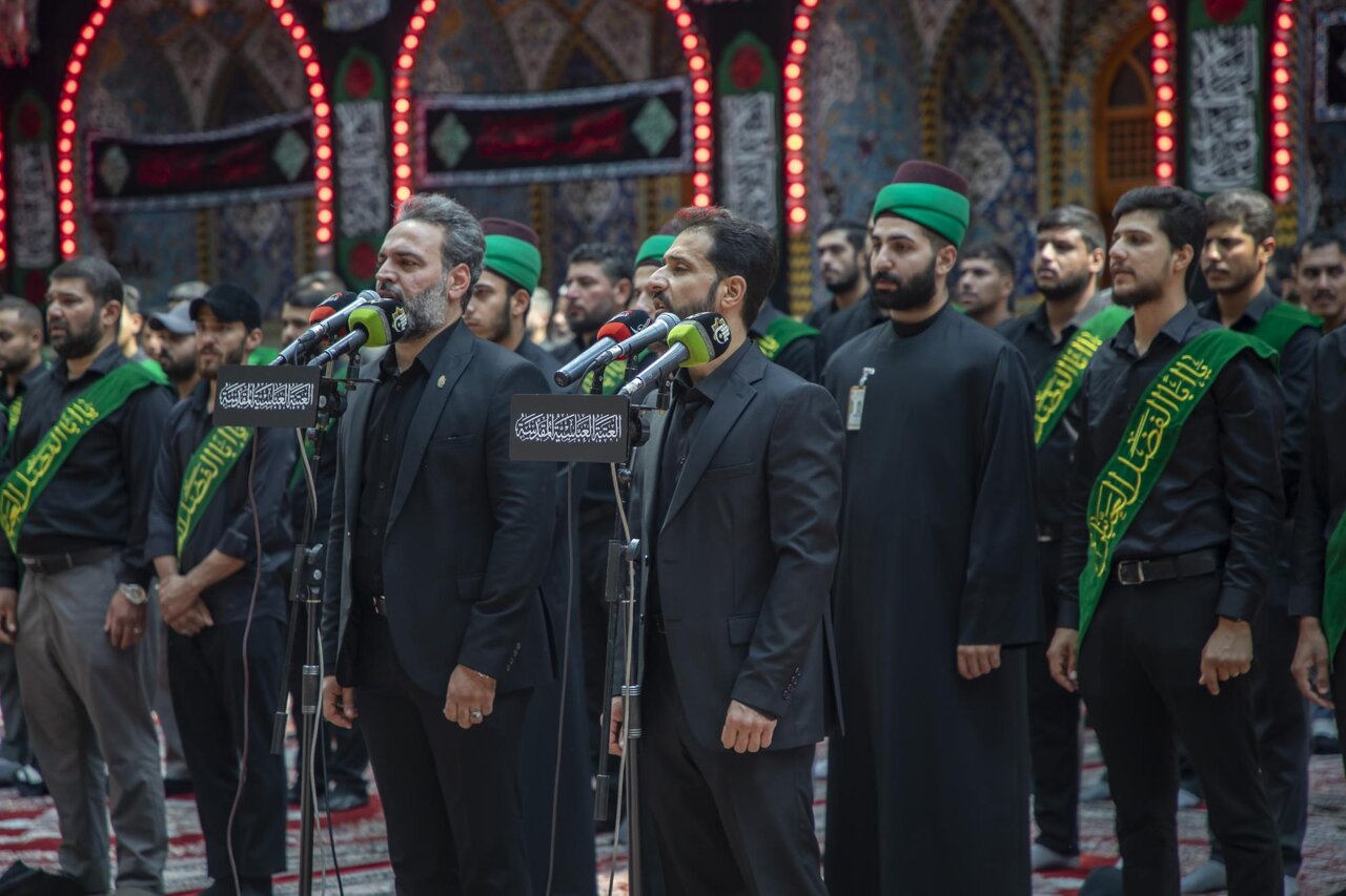 Servants of Al-Abbas holy shrine perform worship rituals in courtyard of the holy shrine