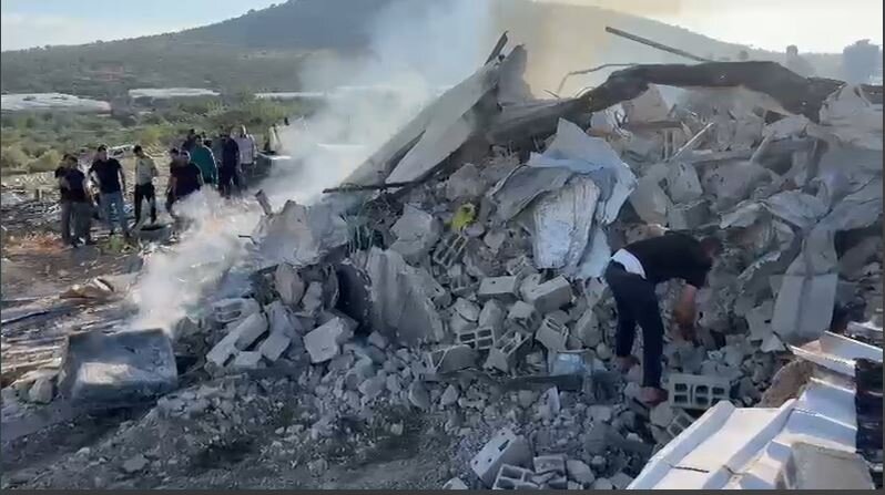 Two Palestinians martyred in Israeli criminal forces attack on building in Jenin