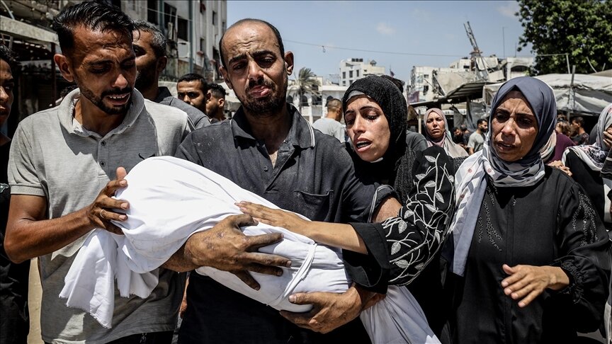 Palestinian child martyred by airdropped aid box in central Gaza