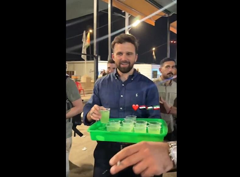 Photos: American Activist Jackson Hinkle Distributes Juices in Holy Karbal during Arbaeen