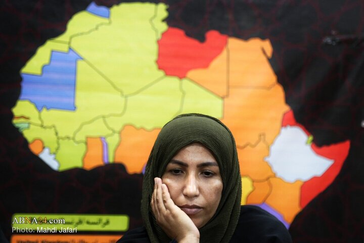 تقرير مصور/ عبير القارة السمراء في درب العشق؛ موكب عشّاق الحسين (ع) يستقبل زوّار الأربعين عند العمود ٣٧٩