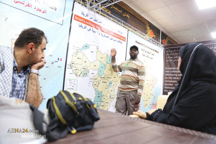 تقرير مصور/ عبير القارة السمراء في درب العشق؛ موكب عشّاق الحسين (ع) يستقبل زوّار الأربعين عند العمود ٣٧٩