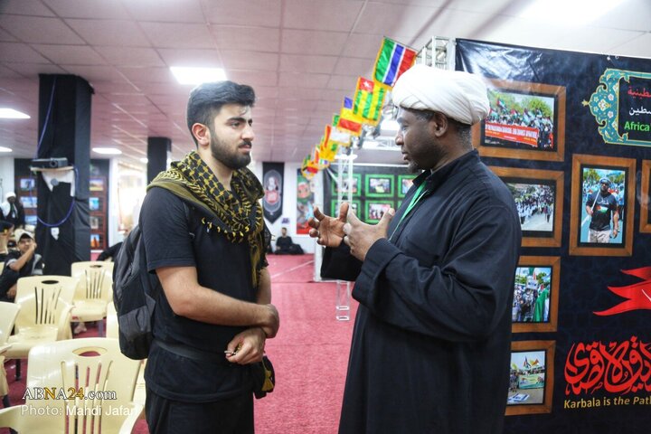 تقرير مصور/ عبير القارة السمراء في درب العشق؛ موكب عشّاق الحسين (ع) يستقبل زوّار الأربعين عند العمود ٣٧٩