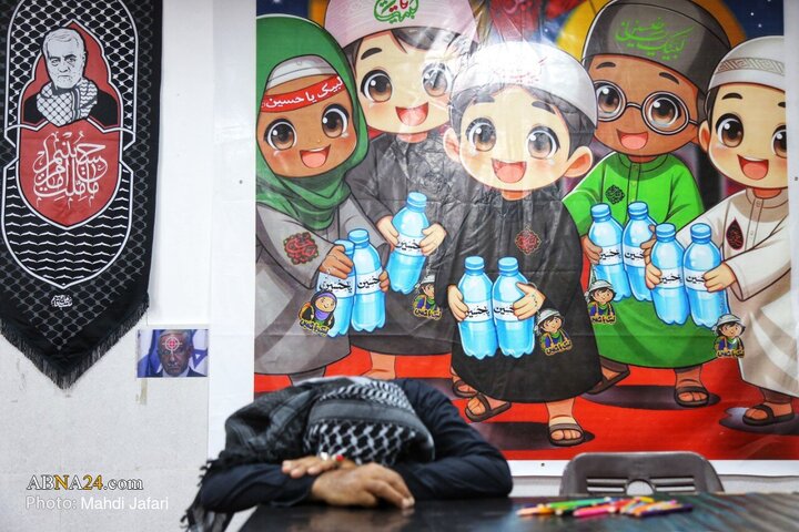 تقرير مصور/ عبير القارة السمراء في درب العشق؛ موكب عشّاق الحسين (ع) يستقبل زوّار الأربعين عند العمود ٣٧٩