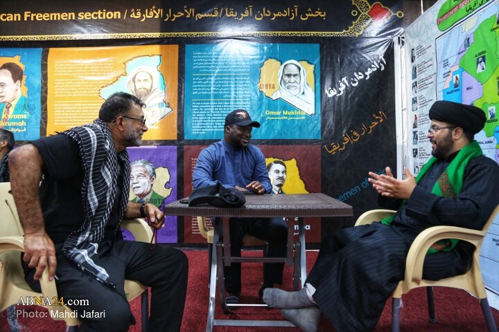 تقرير مصور/ عبير القارة السمراء في درب العشق؛ موكب عشّاق الحسين (ع) يستقبل زوّار الأربعين عند العمود ٣٧٩