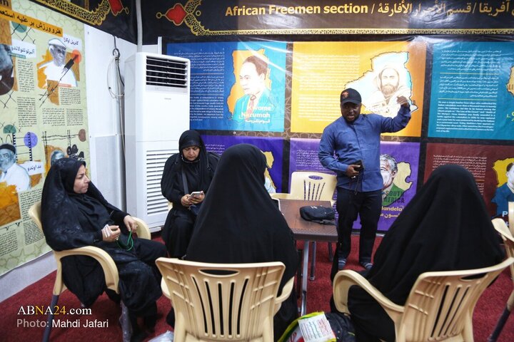 تقرير مصور/ عبير القارة السمراء في درب العشق؛ موكب عشّاق الحسين (ع) يستقبل زوّار الأربعين عند العمود ٣٧٩