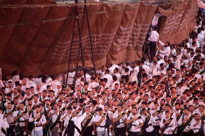 အေမာမ် ဟိုစိုင်းန် (အ.စ) ရောင်ဇာတော်မြတ် နှင့် ဟဇရသ် အဘာစ် (အ.စ) ရောင်ဇာတော် မြတ် တို့၏ ကြား တွင် ဗနီ အာမေရ် ၏ အကြီးဆုံးအလံလည် မှု   ။ ။ Photos