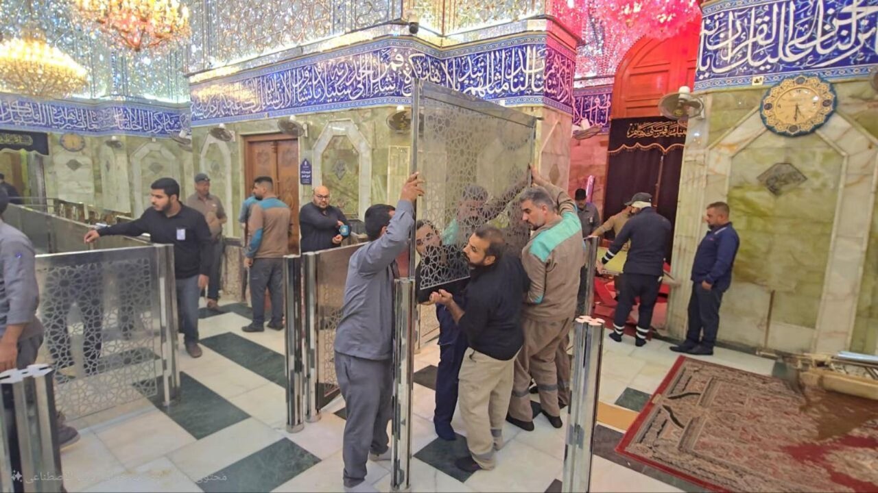 Removing temporary barriers at shrine of Aba al-Fadl al-Abbas after Arbaeen
