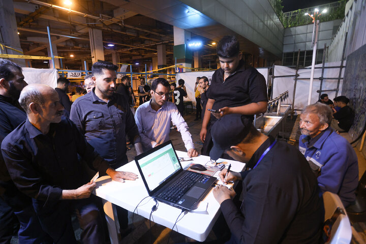 تقرير مصور/ موکب الإمام الرضا(ع) في الحرم الرضوي الطاهر لخدمة الزوار