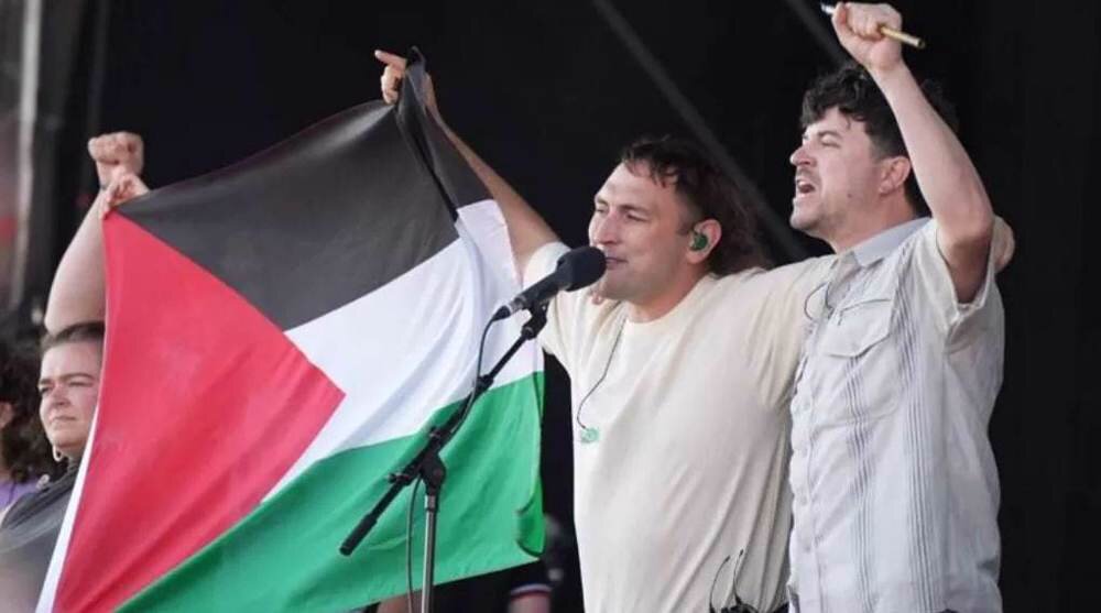 Bands boycott UK festival after Irish group silenced for waving Palestinian flag