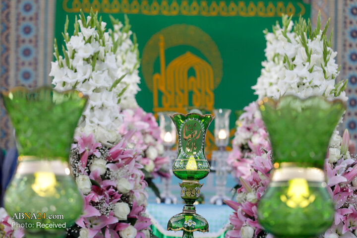 Informe fotográfico |  Ceremonia de sustitución de la bandera del santuario del Imam Reza (P) en vísperas del mes de Rabi‘ al-Awwal