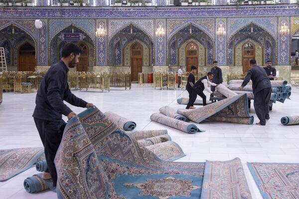 أعمال غسل حرم مرقد أبي الفضل العباس (عليه السلام) وصحنه الشريف