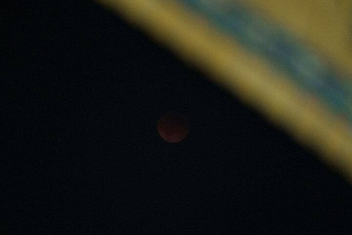 Photos: Beautiful scenes of lunar eclipse above Imam Reza holy shrine