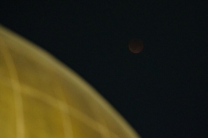 Photos: Beautiful scenes of lunar eclipse above Imam Reza holy shrine