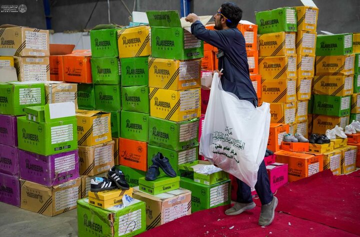 العتبة العلويّة المقدّسة توزّع الكسوة المدرسية على الأيتام والمحتاجين