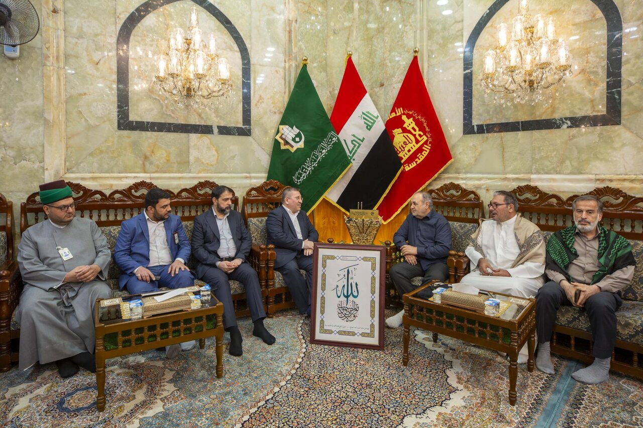 Iranian calligraphers gift a handwritten copy of Holy Quran to Al-Abbas Holy Shrine