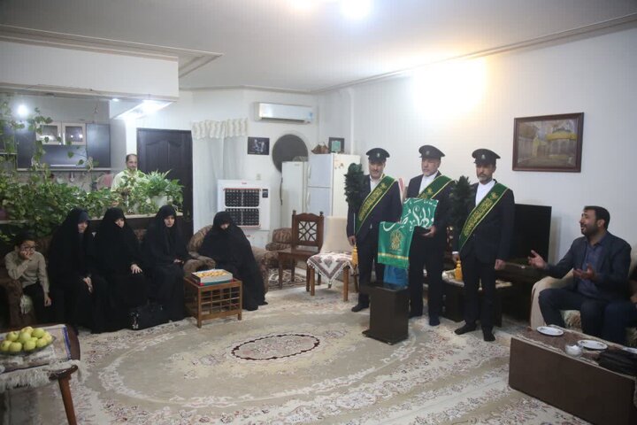 Photos: Honoring mother of martyr Dokhanchi by Hazrat Masoumeh shrine's servants