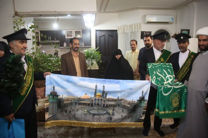 Photos: Honoring mother of martyr Dokhanchi by Hazrat Masoumeh shrine's servants