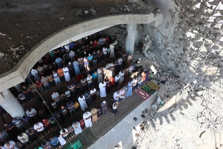 Hundreds of Palestinians perform Friday prayers on ruins of Gaza’s mosques