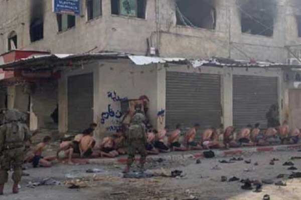 ফিলিস্তিনিদের অপদস্থ করার ছবি-ভিডিও ছড়াচ্ছে ইসরায়েল। ফিলিস্তিনিদের অপদস্থ করার ছবি-ভিডিও ছড়াচ্ছে ইসরায়েল।