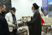 Custodian of Hazrat Masoumeh holy shrine honors Dariush Arjmand with Fatemi Medal