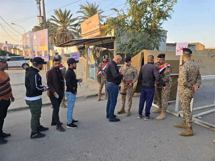 تقرير مصور/ الناخبون يتوافدون الى مراكز الاقتراع للمشاركة في الانتخابات البرلمانية العراقية