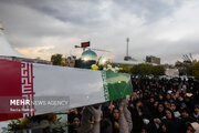 Photos: Funeral of 10 unidentified martyrs in Iran's Karaj