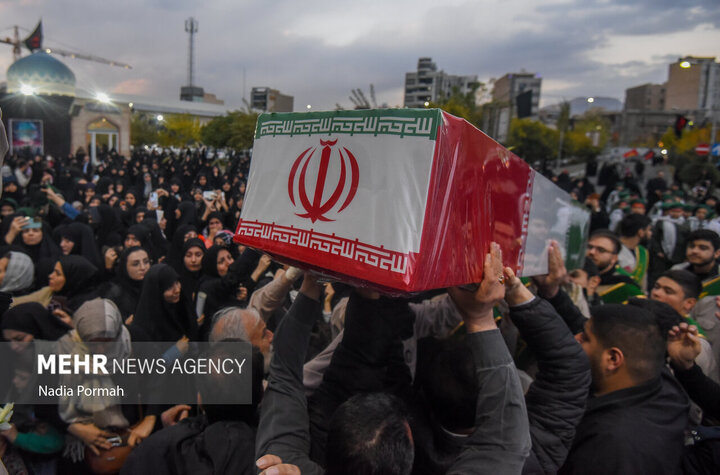 Photos: Funeral of 10 unidentified martyrs in Iran's Karaj
