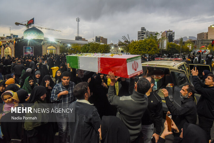Photos: Funeral of 10 unidentified martyrs in Iran's Karaj