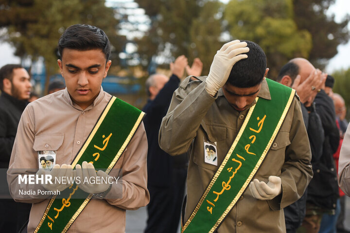 Photos: Funeral of 10 unidentified martyrs in Iran's Karaj
