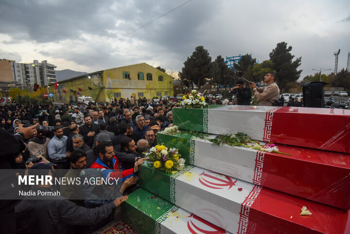 Photos: Funeral of 10 unidentified martyrs in Iran's Karaj