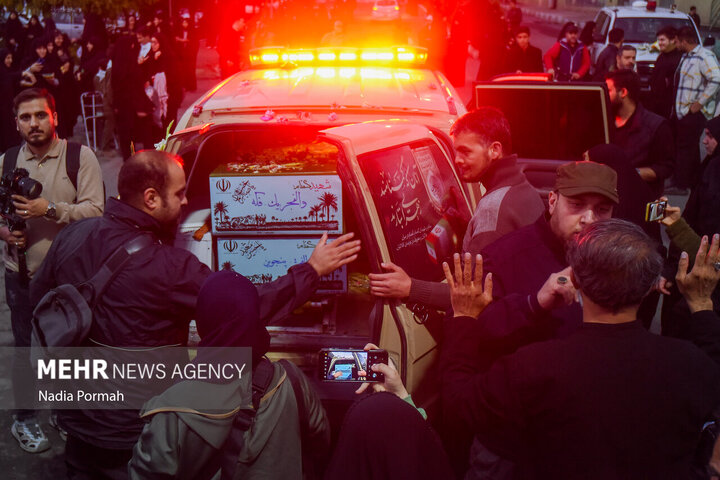 Photos: Funeral of 10 unidentified martyrs in Iran's Karaj