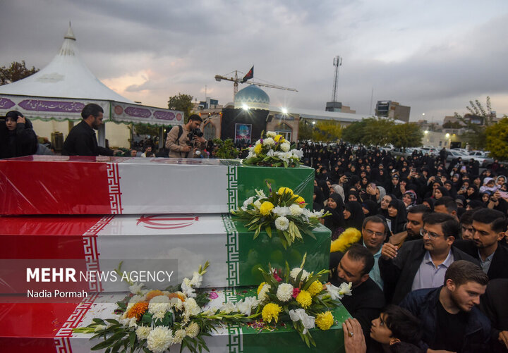 Photos: Funeral of 10 unidentified martyrs in Iran's Karaj