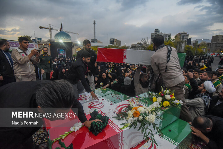 Photos: Funeral of 10 unidentified martyrs in Iran's Karaj