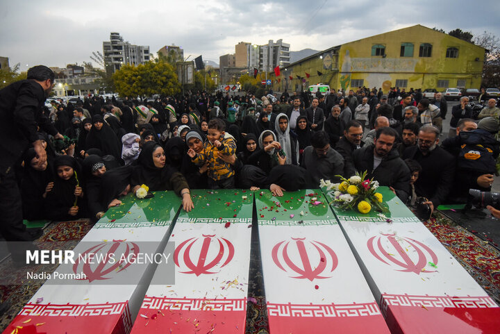Photos: Funeral of 10 unidentified martyrs in Iran's Karaj
