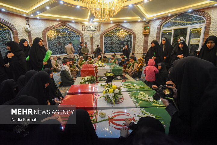 Photos: Funeral of 10 unidentified martyrs in Iran's Karaj