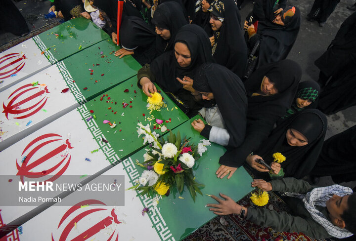 Photos: Funeral of 10 unidentified martyrs in Iran's Karaj