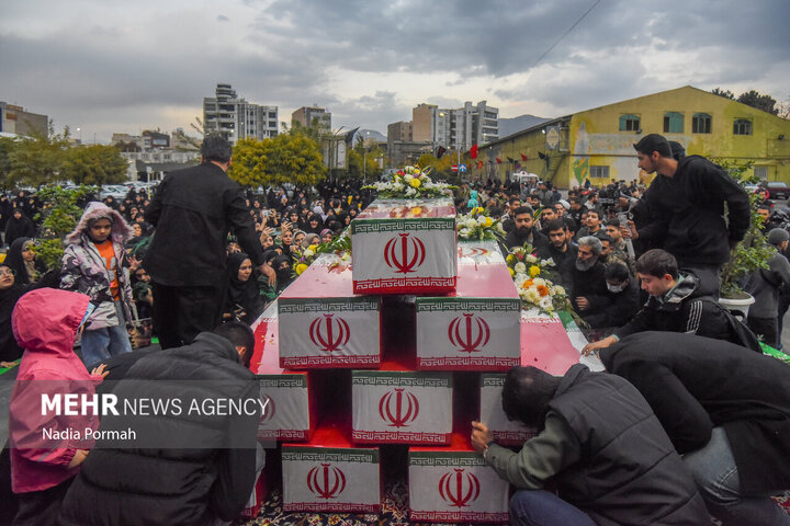 Photos: Funeral of 10 unidentified martyrs in Iran's Karaj