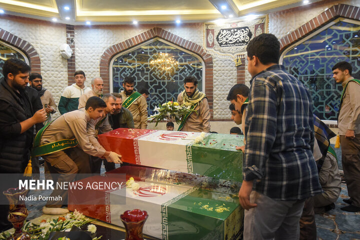 Photos: Funeral of 10 unidentified martyrs in Iran's Karaj
