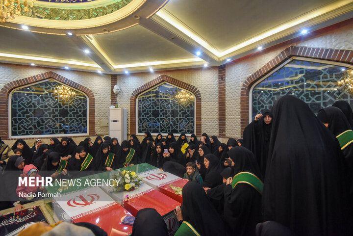 Photos: Funeral of 10 unidentified martyrs in Iran's Karaj