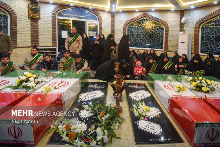 Photos: Funeral of 10 unidentified martyrs in Iran's Karaj