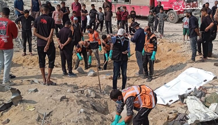 Gaza Health buries 14 martyrs after they could not be identified due to disfigurement, loss of features