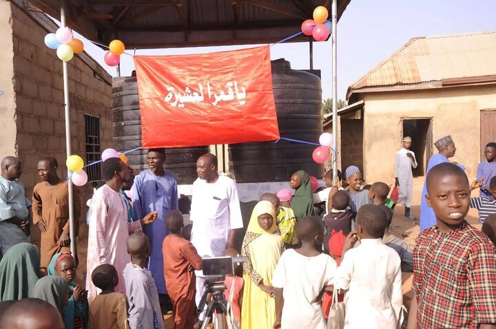 تقرير مصور/ افتتاح مشروع مائي جديد باسم السيدة فاطمة الزهراء بمنطقة نائية في نيجيريا
