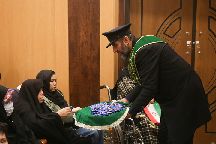 Photos: Honoring people with disabilities in Qom with presence of servants of Hazrat Fatima Masoumeh’s Shrine