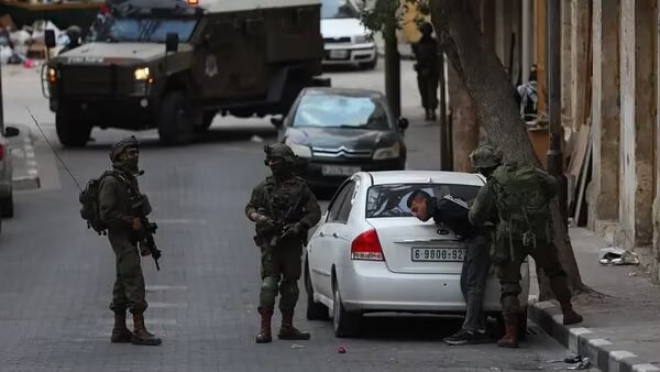 IOF detains several Palestinians in overnight West Bank raids