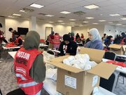 Photos: Who is Hussain volunteers in Texas assemble 400 Winter Hygiene Kits for homeless